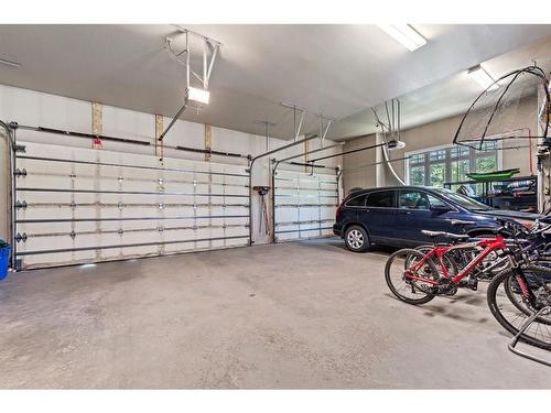 97 Posthill Drive Sw, Calgary, AB - Indoor Photo Showing Garage