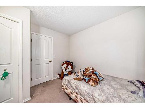 213 Taracove Place Ne, Calgary, AB - Indoor Photo Showing Bedroom