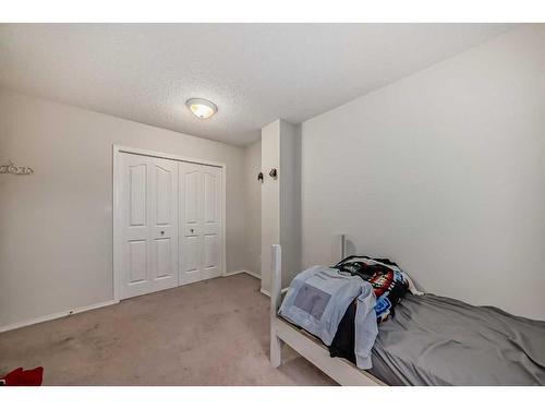 213 Taracove Place Ne, Calgary, AB - Indoor Photo Showing Bedroom