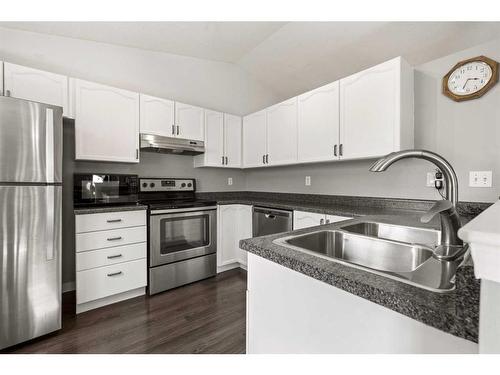 14764 Mt Mckenzie Drive Se, Calgary, AB - Indoor Photo Showing Kitchen With Stainless Steel Kitchen With Double Sink
