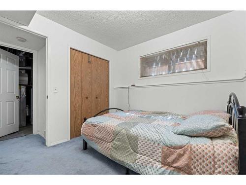 14764 Mt Mckenzie Drive Se, Calgary, AB - Indoor Photo Showing Bedroom