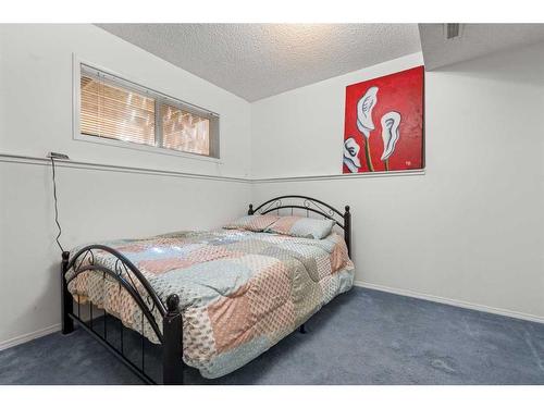 14764 Mt Mckenzie Drive Se, Calgary, AB - Indoor Photo Showing Bedroom