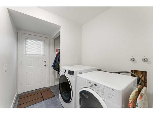 219 Silver Valley Boulevard Nw, Calgary, AB - Indoor Photo Showing Laundry Room