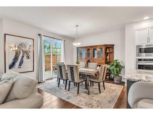 16 Masters Way Se, Calgary, AB - Indoor Photo Showing Dining Room