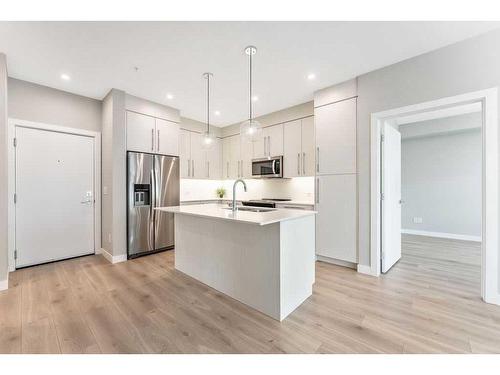 223-383 Smith Street Nw, Calgary, AB - Indoor Photo Showing Kitchen With Stainless Steel Kitchen With Upgraded Kitchen