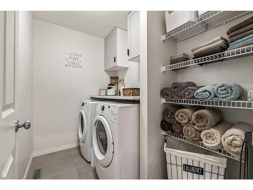 22 Mount Rae Place, Okotoks, AB - Indoor Photo Showing Laundry Room