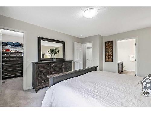 22 Mount Rae Place, Okotoks, AB - Indoor Photo Showing Bedroom