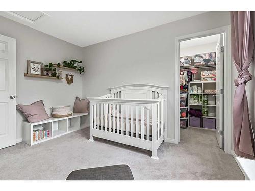 22 Mount Rae Place, Okotoks, AB - Indoor Photo Showing Bedroom