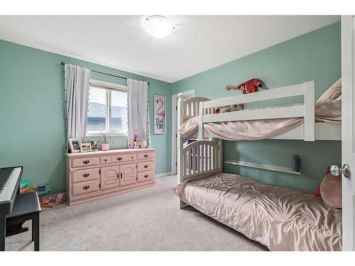 22 Mount Rae Place, Okotoks, AB - Indoor Photo Showing Bedroom