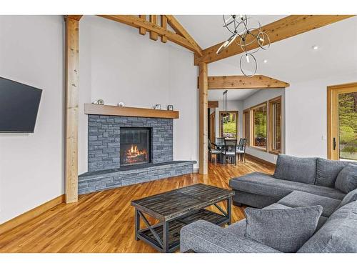 860 Silvertip Heights, Canmore, AB - Indoor Photo Showing Living Room With Fireplace