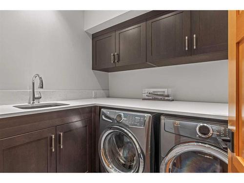 860 Silvertip Heights, Canmore, AB - Indoor Photo Showing Laundry Room