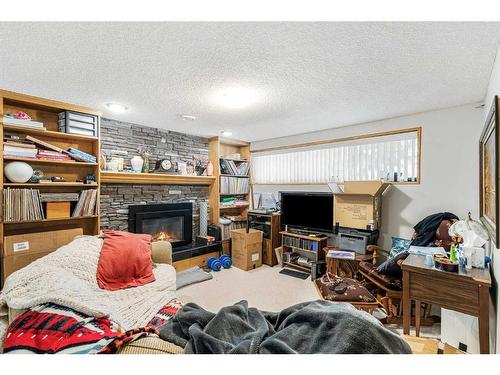 1320 56 Avenue Nw, Calgary, AB - Indoor With Fireplace