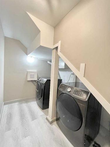 101 Forest Road Se, Calgary, AB - Indoor Photo Showing Laundry Room