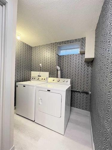 101 Forest Road Se, Calgary, AB - Indoor Photo Showing Laundry Room