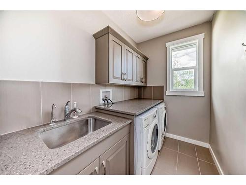 70 Ascot Crescent Sw, Calgary, AB - Indoor Photo Showing Laundry Room