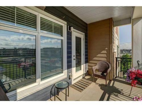 2210-3727 Sage Hill Drive Nw, Calgary, AB - Outdoor With Deck Patio Veranda With Exterior