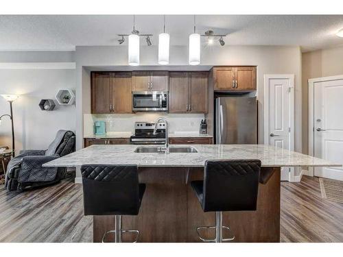 2210-3727 Sage Hill Drive Nw, Calgary, AB - Indoor Photo Showing Kitchen With Upgraded Kitchen