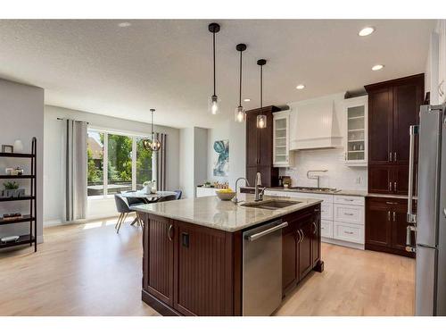 1177 Coopers Drive Sw, Airdrie, AB - Indoor Photo Showing Kitchen With Upgraded Kitchen