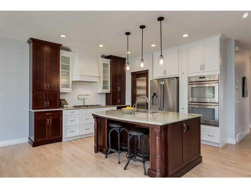 1177 Coopers Drive Sw, Airdrie, AB - Indoor Photo Showing Kitchen With Upgraded Kitchen