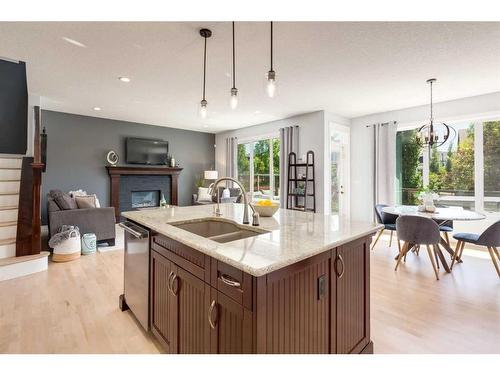 1177 Coopers Drive Sw, Airdrie, AB - Indoor Photo Showing Kitchen With Double Sink