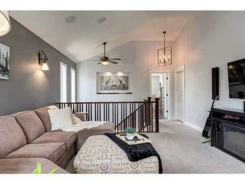 1177 Coopers Drive Sw, Airdrie, AB - Indoor Photo Showing Living Room