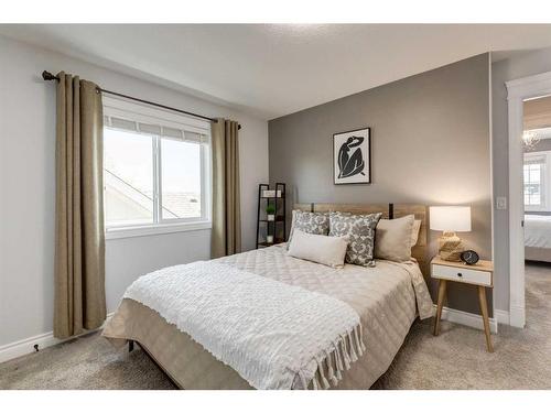 1177 Coopers Drive Sw, Airdrie, AB - Indoor Photo Showing Bedroom