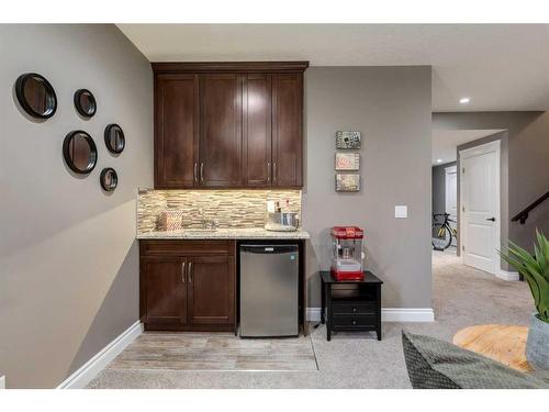 1177 Coopers Drive Sw, Airdrie, AB - Indoor Photo Showing Living Room