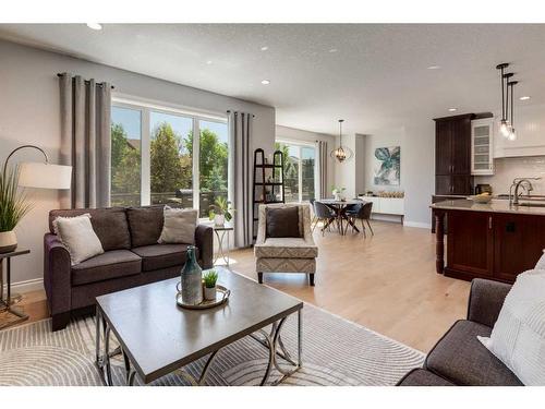 1177 Coopers Drive Sw, Airdrie, AB - Indoor Photo Showing Living Room