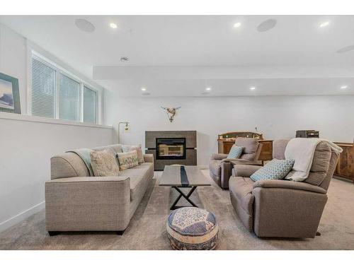 4916 19 Avenue Nw, Calgary, AB - Indoor Photo Showing Living Room With Fireplace