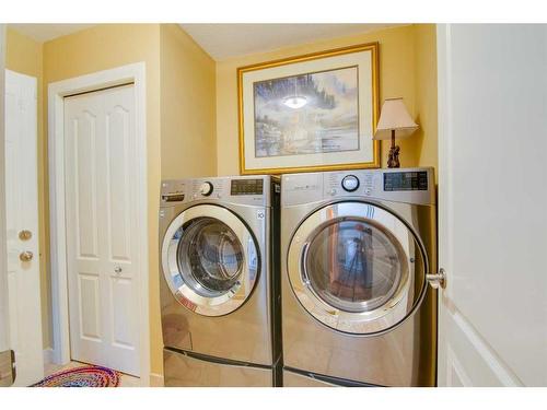 52 Cranleigh Drive Se, Calgary, AB - Indoor Photo Showing Laundry Room