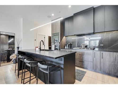 205-835 78 Street Sw, Calgary, AB - Indoor Photo Showing Kitchen With Upgraded Kitchen