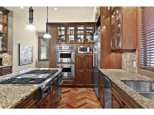 13-1359 69 Street Sw, Calgary, AB - Indoor Photo Showing Kitchen With Double Sink With Upgraded Kitchen