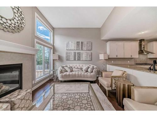 61 Evansview Manor Nw, Calgary, AB - Indoor Photo Showing Living Room With Fireplace