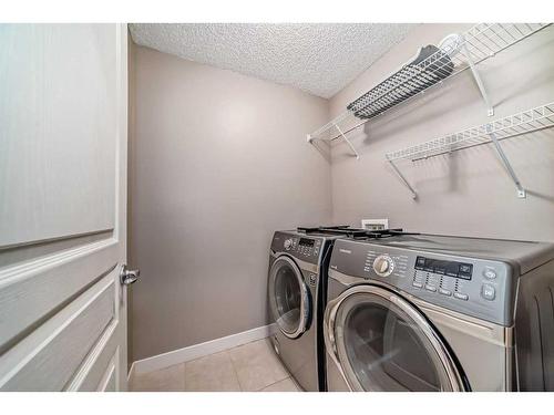 61 Evansview Manor Nw, Calgary, AB - Indoor Photo Showing Laundry Room