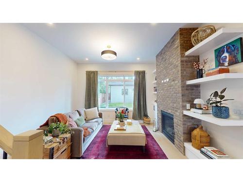 4317 16 Street Sw, Calgary, AB - Indoor Photo Showing Living Room With Fireplace