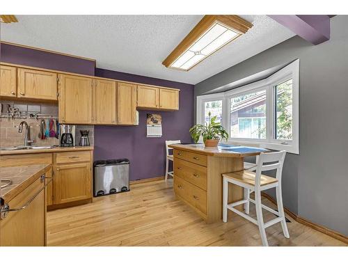 631 Ranch Estates Place Nw, Calgary, AB - Indoor Photo Showing Kitchen With Double Sink