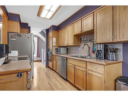 631 Ranch Estates Place Nw, Calgary, AB - Indoor Photo Showing Kitchen With Double Sink