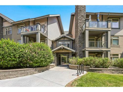 320-35 Aspenmont Heights Sw, Calgary, AB - Outdoor With Balcony With Facade