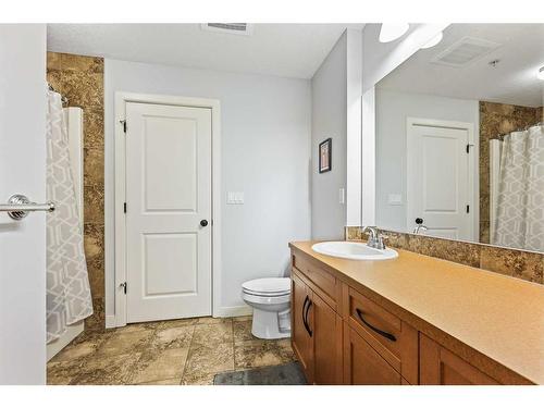 320-35 Aspenmont Heights Sw, Calgary, AB - Indoor Photo Showing Bathroom