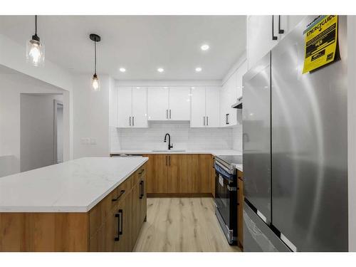 48 Radcliffe Court, Calgary, AB - Indoor Photo Showing Kitchen With Upgraded Kitchen