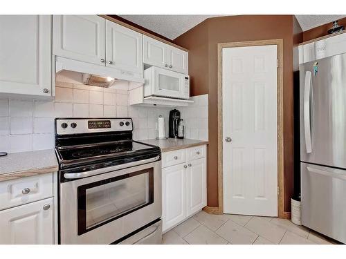 66 Tuscany Hills Point Nw, Calgary, AB - Indoor Photo Showing Kitchen