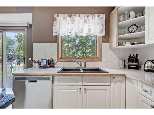 66 Tuscany Hills Point Nw, Calgary, AB - Indoor Photo Showing Kitchen With Double Sink