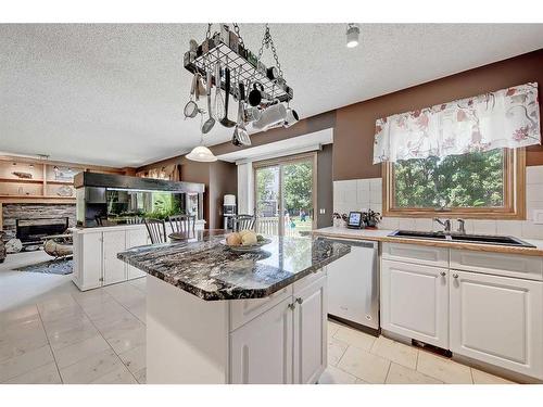 66 Tuscany Hills Point Nw, Calgary, AB - Indoor Photo Showing Kitchen With Double Sink