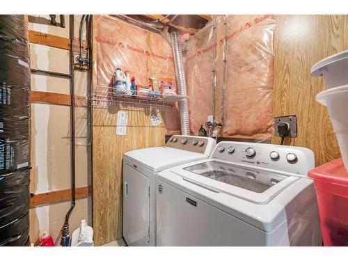 45 Patina Park Sw, Calgary, AB - Indoor Photo Showing Laundry Room