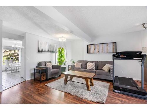 45 Patina Park Sw, Calgary, AB - Indoor Photo Showing Living Room