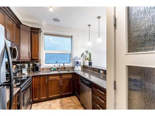 103-41 6 Street Ne, Calgary, AB - Indoor Photo Showing Kitchen With Double Sink