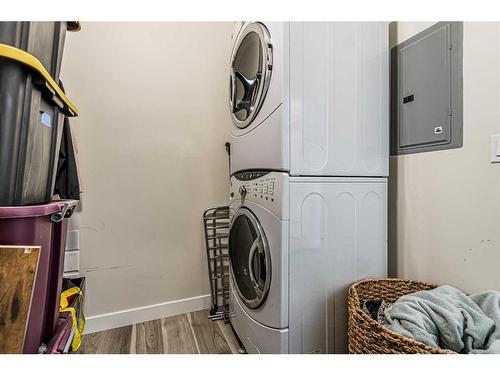 103-41 6 Street Ne, Calgary, AB - Indoor Photo Showing Laundry Room