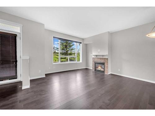 19 Kincora Heath Nw, Calgary, AB - Indoor Photo Showing Living Room With Fireplace