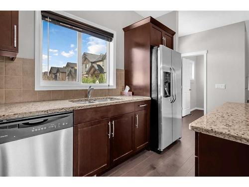 19 Kincora Heath Nw, Calgary, AB - Indoor Photo Showing Kitchen With Double Sink