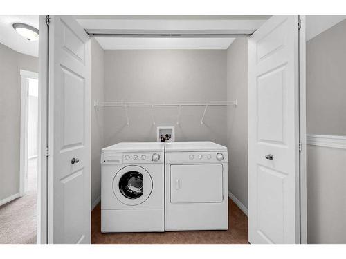 19 Kincora Heath Nw, Calgary, AB - Indoor Photo Showing Laundry Room